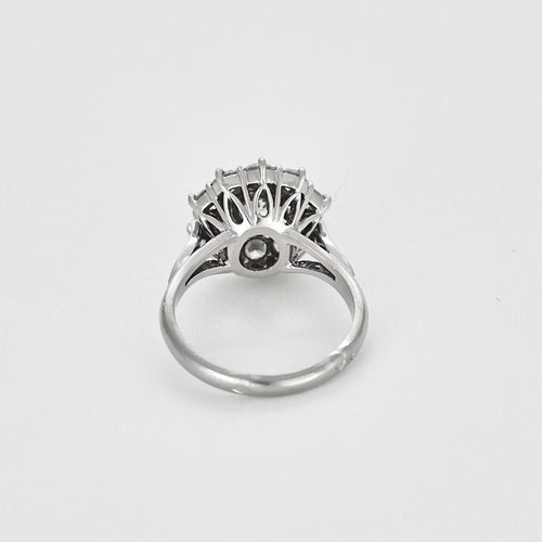 Bague 49 Bague marguerite en or blanc, platine et diamants 58 Facettes B250467