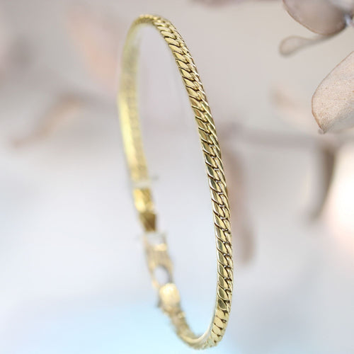Bracelet Bracelet en or occasion gourmette aplatie 58 Facettes 24-330