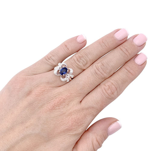 Bague 49 Bague Mellerio "Reine de Coeur Désirée" or blanc, diamants, saphir. 58 Facettes 33647