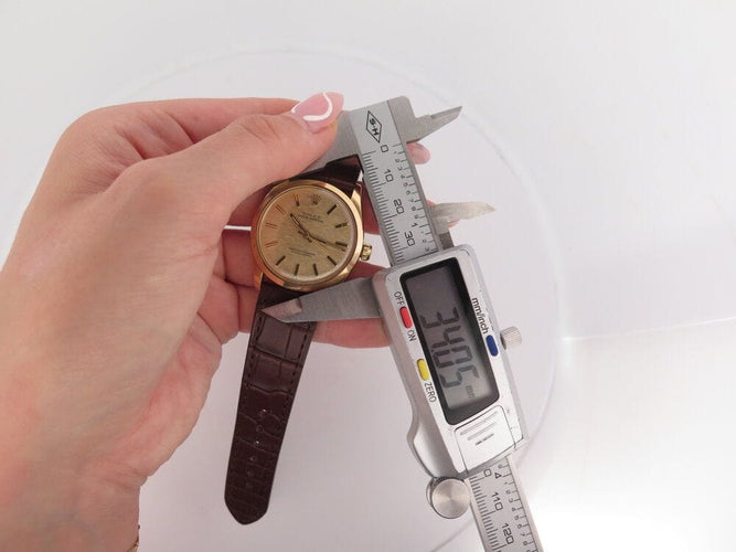 Montre vintage montre ROLEX oyster perpetual 34 mm or jaune automatique 58 Facettes 261281