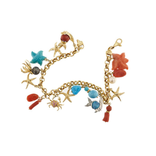 Bracelet Bracelet avec breloques, corail, perles et turquoises 58 Facettes 32494