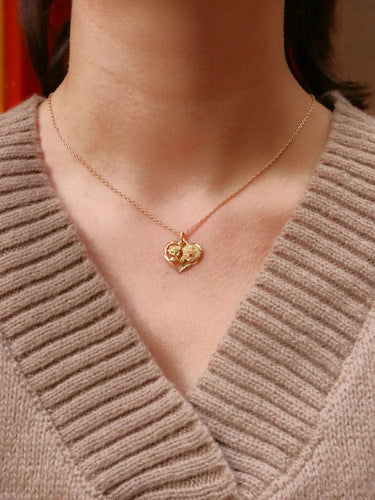 Pendentif Médaille amour Augis coeur Plus qu'hier moins que demain or jaune rubis 58 Facettes J520