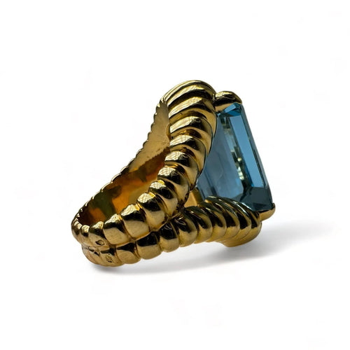 Bague Bague vintage en or jaune montée d’une Aigue-Marine Santa Maria de 17carats. 58 Facettes