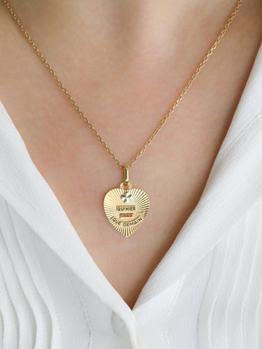 Pendentif AUGIS - Médaille amour cœur "Plus qu'hier moins que demain" or jaune rubis 58 Facettes 1128.4