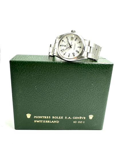 Montre ROLEX - Date réf. 1500 verre plexi 58 Facettes
