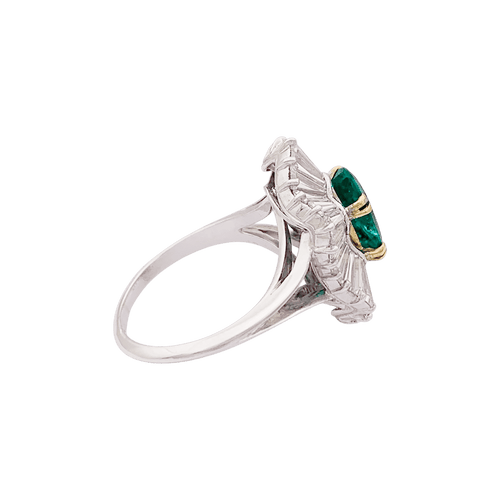 Bague 54 Bague "Jupe" platine, or jaune, diamants, émeraude. 58 Facettes 34333