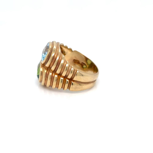 Bague 52 BULGARI - Bague Double Baccellato, or jaune avec topaze bleue et péridot, vers 1980 58 Facettes