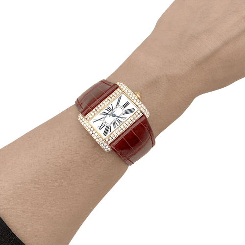 Montre Montre Cartier, "Tank Divan", or jaune et diamants. 58 Facettes 34640