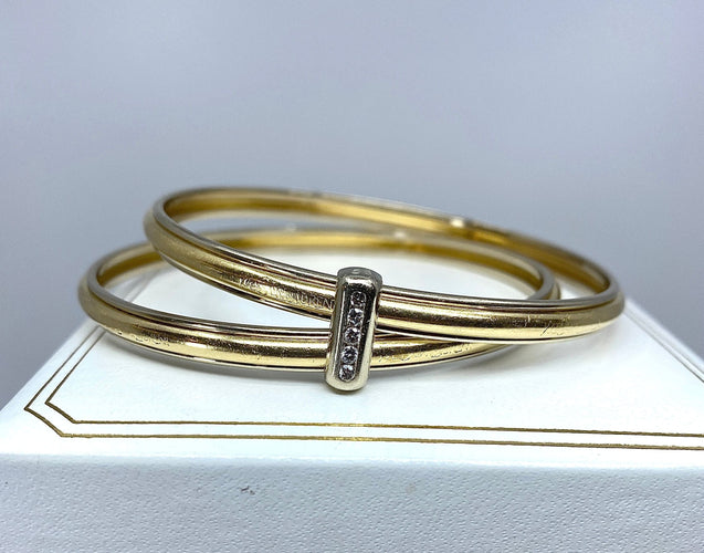 Bracelet Bracelet double joncs, or blanc, diamants, Yves Saint Laurent 58 Facettes AB601