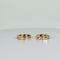 Boucles d'oreilles Boucles d’oreilles créoles avec rubis et diamants en or jaune 14k 58 Facettes 2512013
