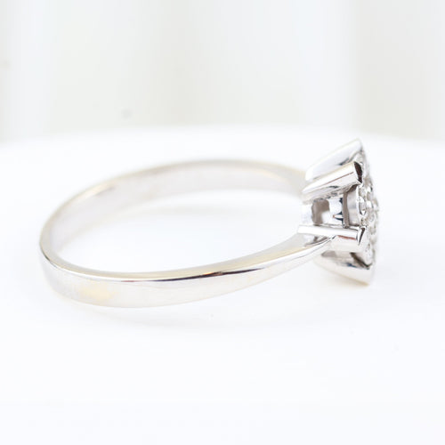 Bague Bague rosette en or blanc 18 carats sertie de diamants taille brillant de 0,28 carat 58 Facettes 159/24K