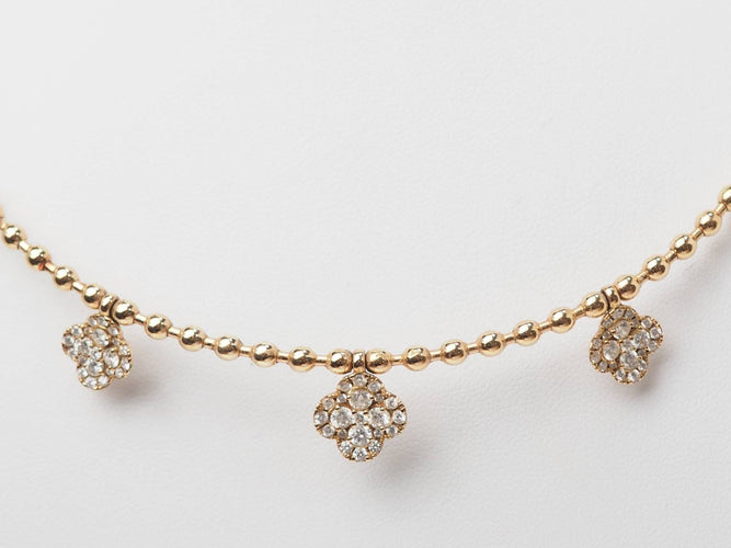 Collier Collier boules rigide et trèfles en or rose et diamants 58 Facettes 33100