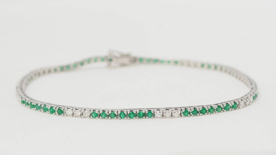 Bracelet Bracelet rivière en or blanc, émeraudes et diamants 58 Facettes 32238