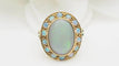 Bague 48 Bague ancienne en or jaune et cabochon d'opale 58 Facettes 32676
