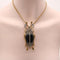 Broche Broche scarabée en or et argent avec diamants, onyx et rubis 58 Facettes