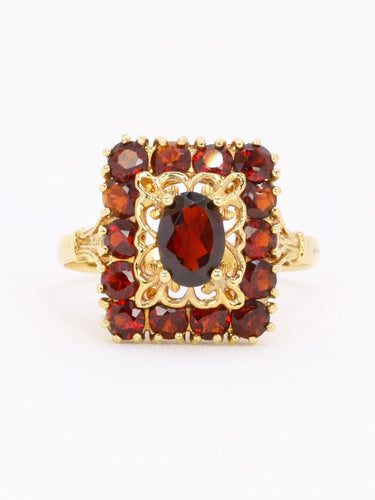 Bague vintage or jaune grenats