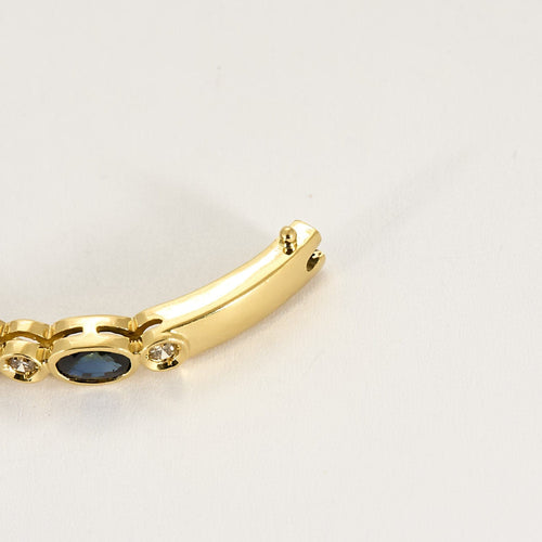 Bracelet Bracelet jonc en or jaune, diamants et saphirs 58 Facettes GAP1474