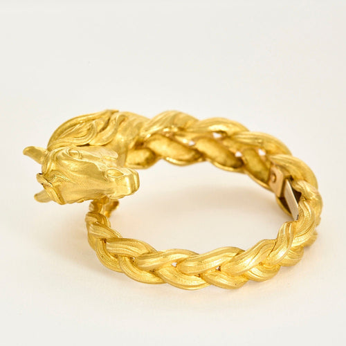 HERMES - Bracelet jonc en or jaune a motif de cheval