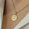 Pendentif Maison Augis - Pendentif Médaille d'Amour en or jaune et rubis 58 Facettes 32303