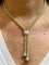 Collier Collier maille popocorn à pompom en or 18 carats 58 Facettes