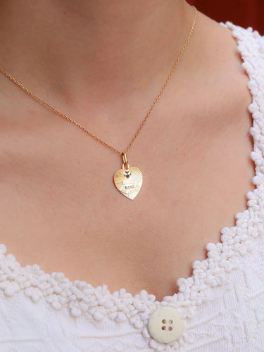 Pendentif Médaille amour Augis coeur Plus qu'hier moins que demain or jaune rubis 58 Facettes J476