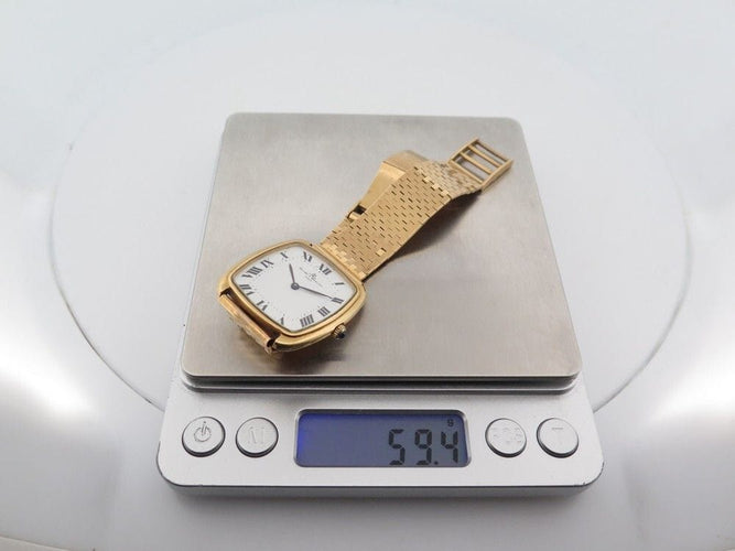 Montre vintage montre baume & mercier carree extra plate or jaune mecanique 58 Facettes 260383