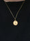 Pendentif AUGIS- Médaille amour ronde Plus qu’hier moins que demain or jaune diamants rubis 58 Facettes J256
