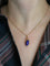 Pendentif Pendentif charms vintage pichet or jaune émail bleu 58 Facettes 1099.11