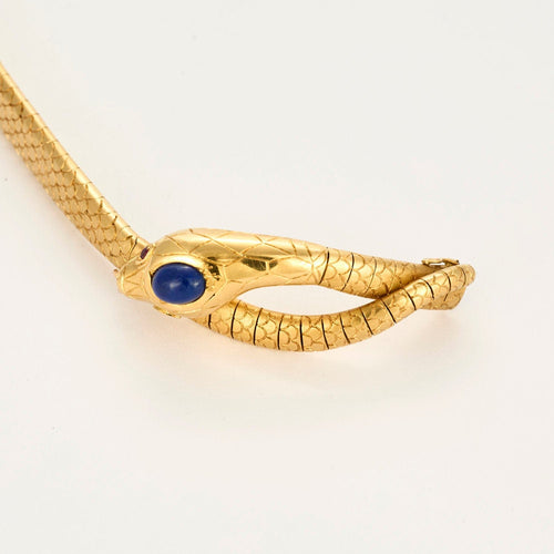 Bracelet Bracelet serpent articulé or jaune, rubis et lapis lazulli 58 Facettes BIA0926