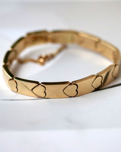 Bracelet Bracelet Maille Articulée Cœur signé "Piaget" en Or Jaune 58 Facettes A11266