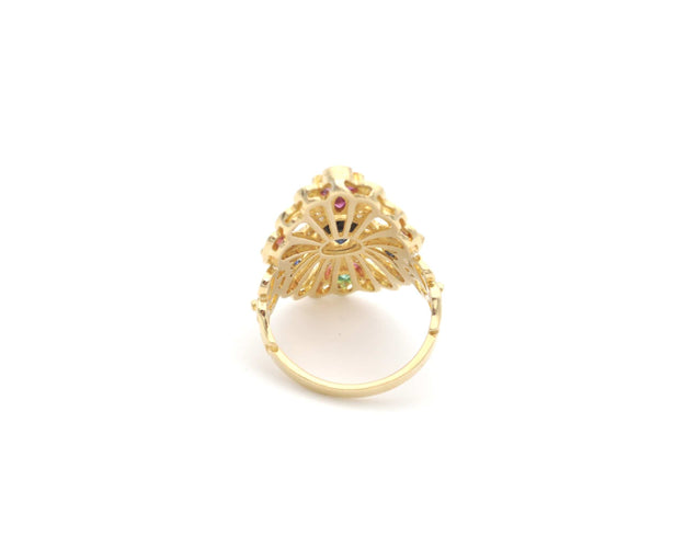Bague Bague vintage en or jaune avec pierres précieuses 58 Facettes