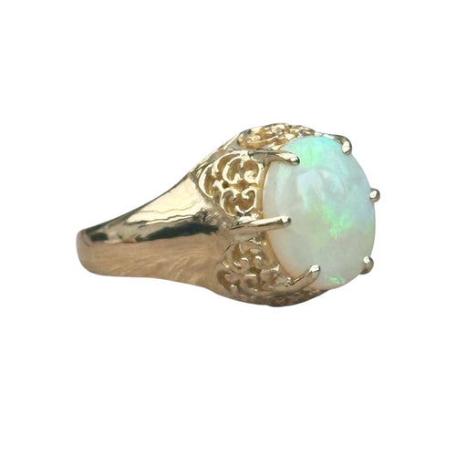 Bague 51 Bague ancienne ajourée sertie d'une opale cabochon 58 Facettes 321