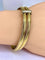 Bracelet Bracelet double joncs, or blanc, diamants, Yves Saint Laurent 58 Facettes AB601