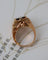 Bague 50 Bague Dôme Fleur Or Jaune et Grenat 58 Facettes A11212