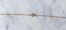 Collier Collier noeud or et cabochons émeraude 58 Facettes