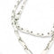 Collier CARTIER - chaîne et médaillon vintage en or blanc 58 Facettes