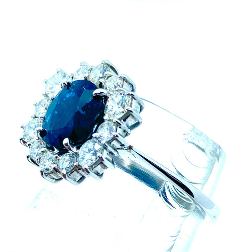 Bague Bague hexagonale sertie de diamants et ornée d'un saphir central 58 Facettes