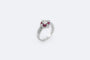 Bague 12 / Oro Bianco Anello in oro bianco con solitario, diamanti e rubini 58 Facettes ANL701