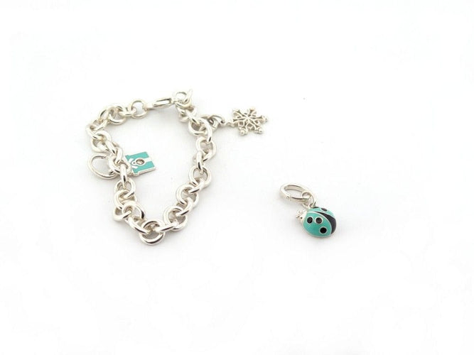 Bracelet bracelet TIFFANY & CO chaine a breloques charms argent 58 Facettes 259368
