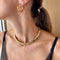 Bracelet Bracelet manchette Bulgari Parentesi en or et acier 58 Facettes