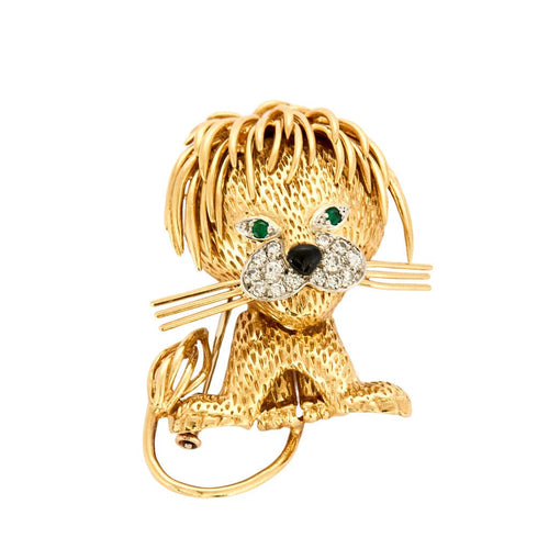 Broche Broche Lion en or jaune et blanc, émeraudes, diamants et onyx 58 Facettes 250094