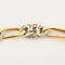 Collier Collier maille figaro en or jaune et gris, et diamants 58 Facettes CAN1120