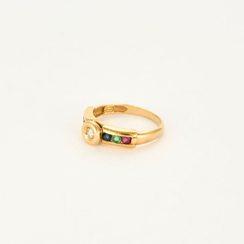 Bague 49 Bague or jaune centré d'un diamants, épaulée rubis, saphir, émeraude 58 Facettes SMA0110