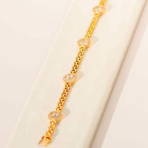 Chopard „Happy Diamonds“ Armband aus 18 Karat Gelbgold | 96 Diamanten & 12 lose Brillanten | Dreireihiges Gliederarmband | 18cm 58 Facettes 3282