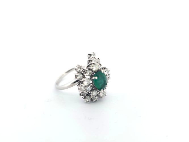 Bague 57 Bague en or blanc avec émeraude et diamants 58 Facettes