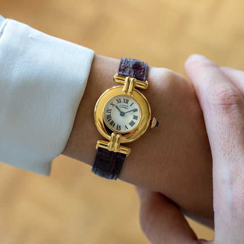 Montre Cartier - Montre Must Colisée cadran ivoire à chiffres romains en vermeil 58 Facettes