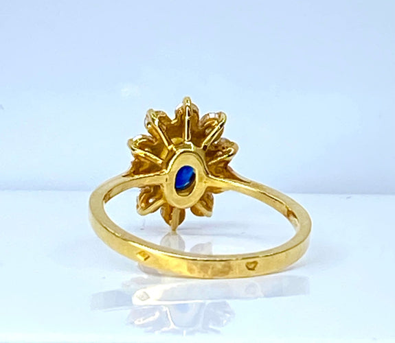 Bague 49 Bague marguerite en or jaune, saphir et diamants 58 Facettes AB655