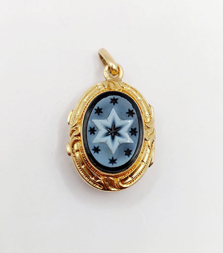 Pendentif Pendentif porte photo souvenir antique or jaune 18k plaques noires, croix et étoiles (circa 1900) 58 Facettes A06198