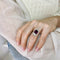Bague 54 Bague marguerite rhodolite et diamants en or jaune 58 Facettes
