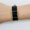 Montre Cartier - Montre Modèle "Tank Must" en argent, plaqué or et cadran noir. 58 Facettes